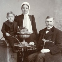 Couple with their grandson in Gnesen, Prussia (Gniezno, Poland)